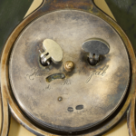 The back of a Russian gold, nephrite and enamel desk clock.